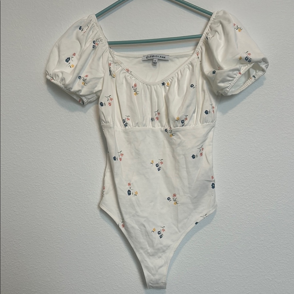 New without tag, never used White Floral Bodysuit